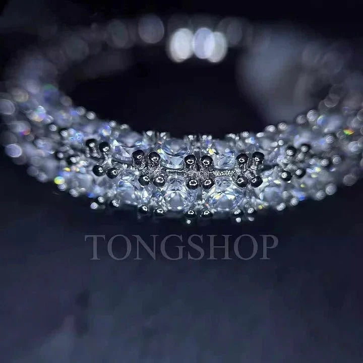 Three Rows of Diamond Rings in White Gold